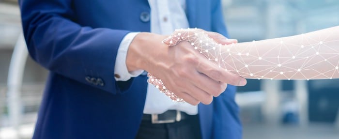 Human-and-artifical-intelligence-handshake